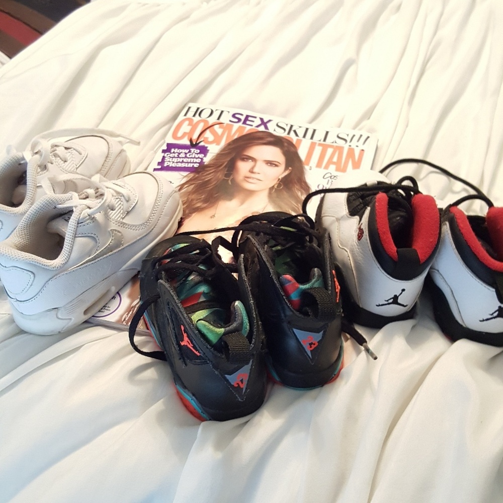 3 airs of baby boy Nikes Jordan's black and white